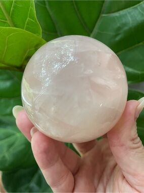 Rose quartz carved polished crystal sphere